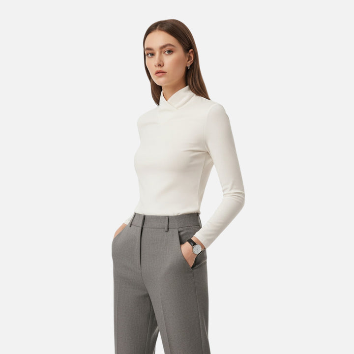 Stylish long sleeve criss-cross neck blouse for women. A versatile top, ideal for office or chic everyday wear.