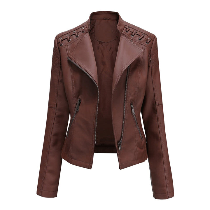 Close-up of asymmetrical zip on a women's cropped jacket, highlighting the elegant and unique design details