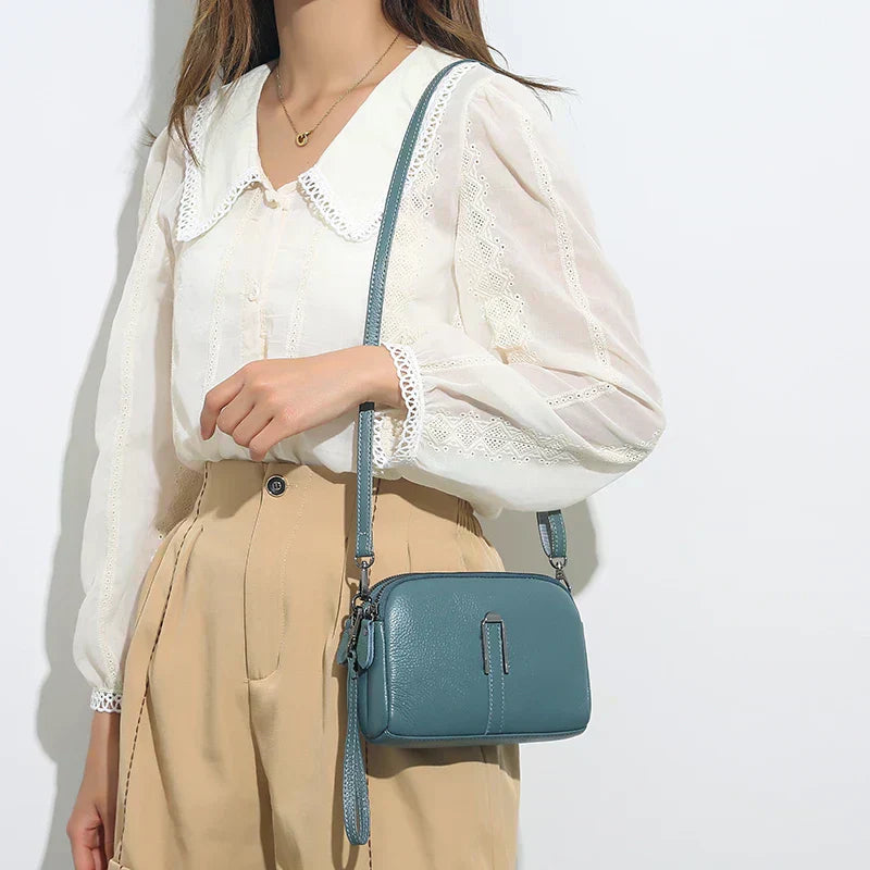 Fashionable compact shoulder bag for women, ideal for summer outfits and accessories.