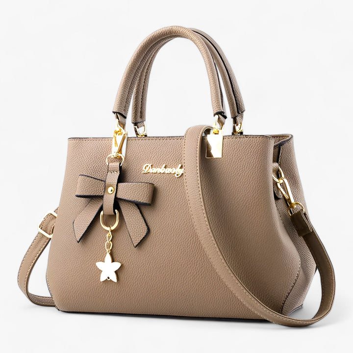 Elegant women's crossbody shoulder bag for daily & business use, with a sophisticated design.