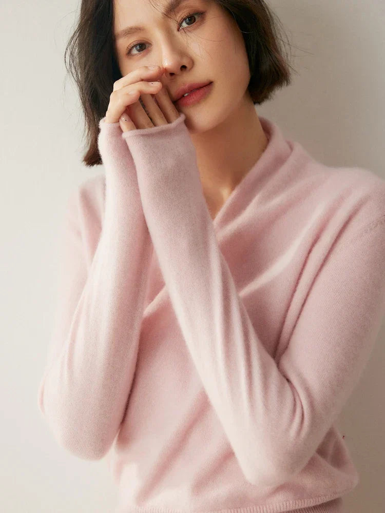 Women's white crossover wrap sweater, a fresh and elegant addition to winter fashion.