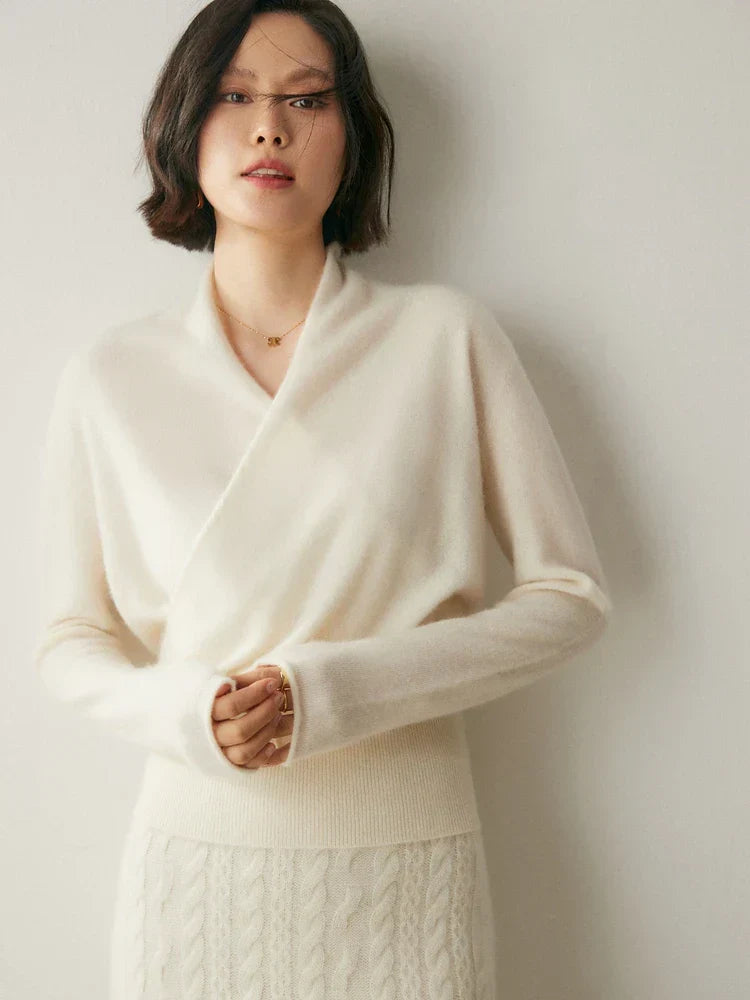 Women's knit wrap sweater in a vibrant blue, adding a pop of color to winter outfits.