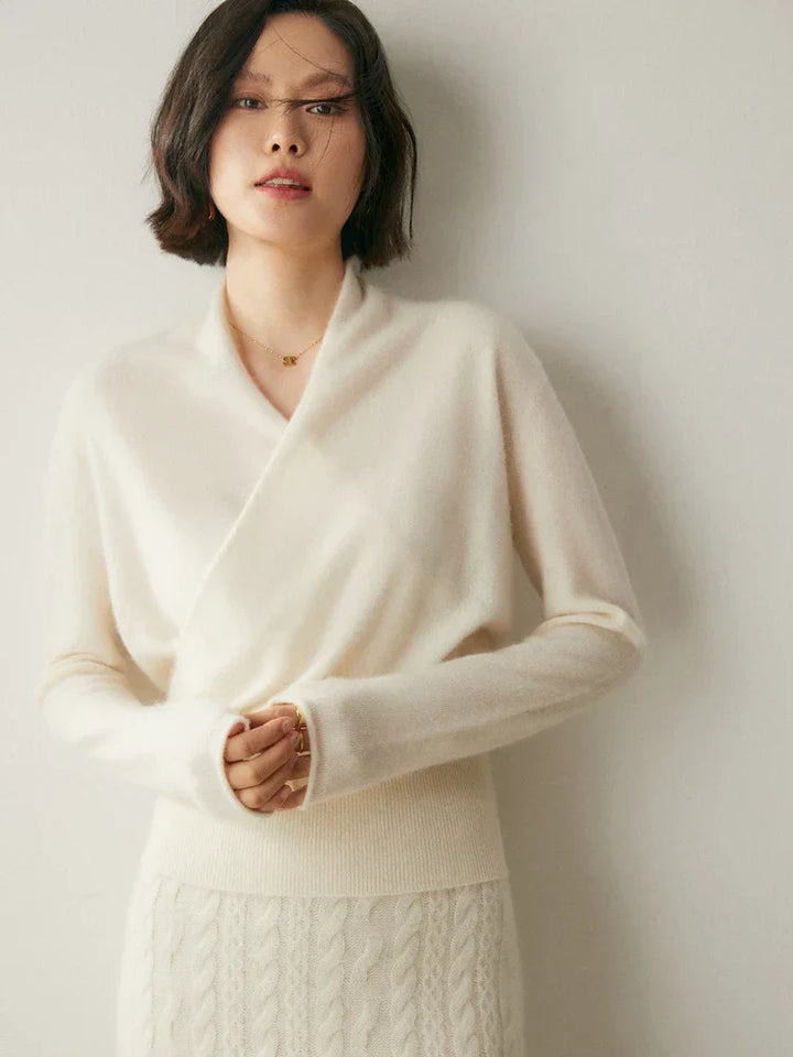 Women's knit wrap sweater in a vibrant blue, adding a pop of color to winter outfits.
