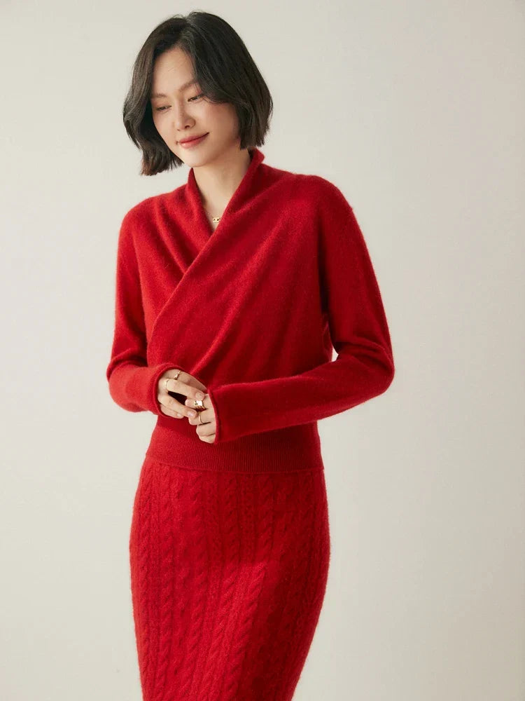 Texture shot of the soft, warm fabric of an elegant women's crossover wrap sweater.