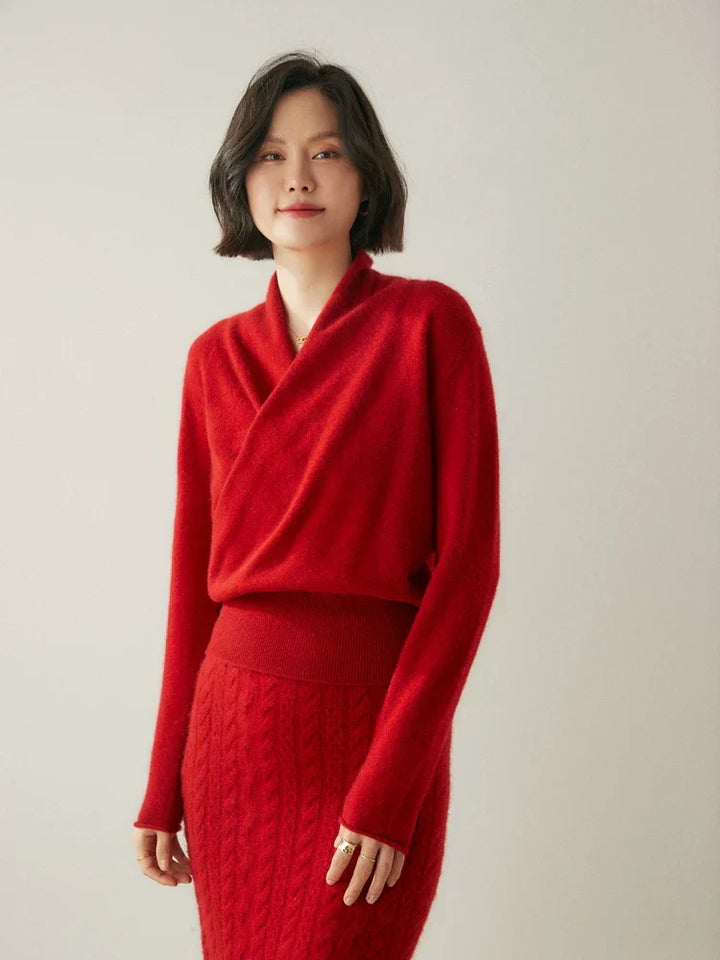 Women's sophisticated black wrap knitwear, perfect for layering during cooler months.