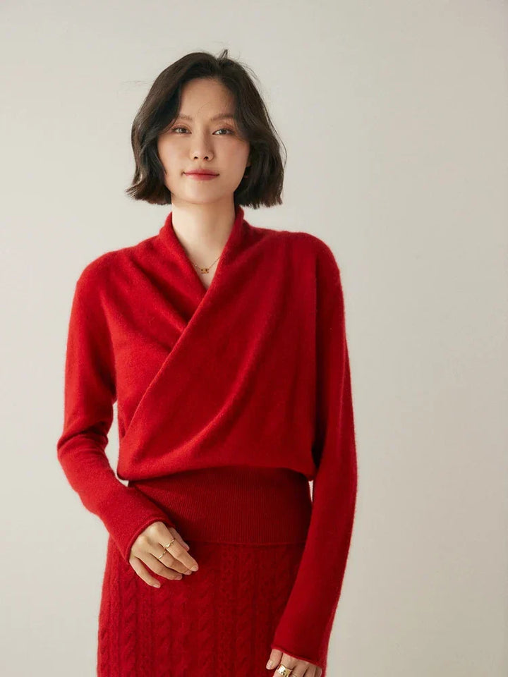 Full-length shot of a women's elegant crossover wrap sweater, showcasing its design.