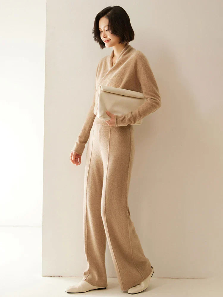 Close-up of the V-neckline on a women's crossover wrap sweater, flattering design.