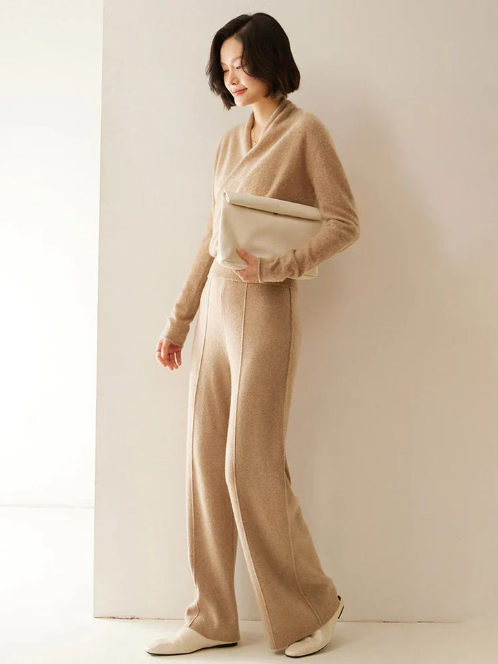 Close-up of the V-neckline on a women's crossover wrap sweater, flattering design.
