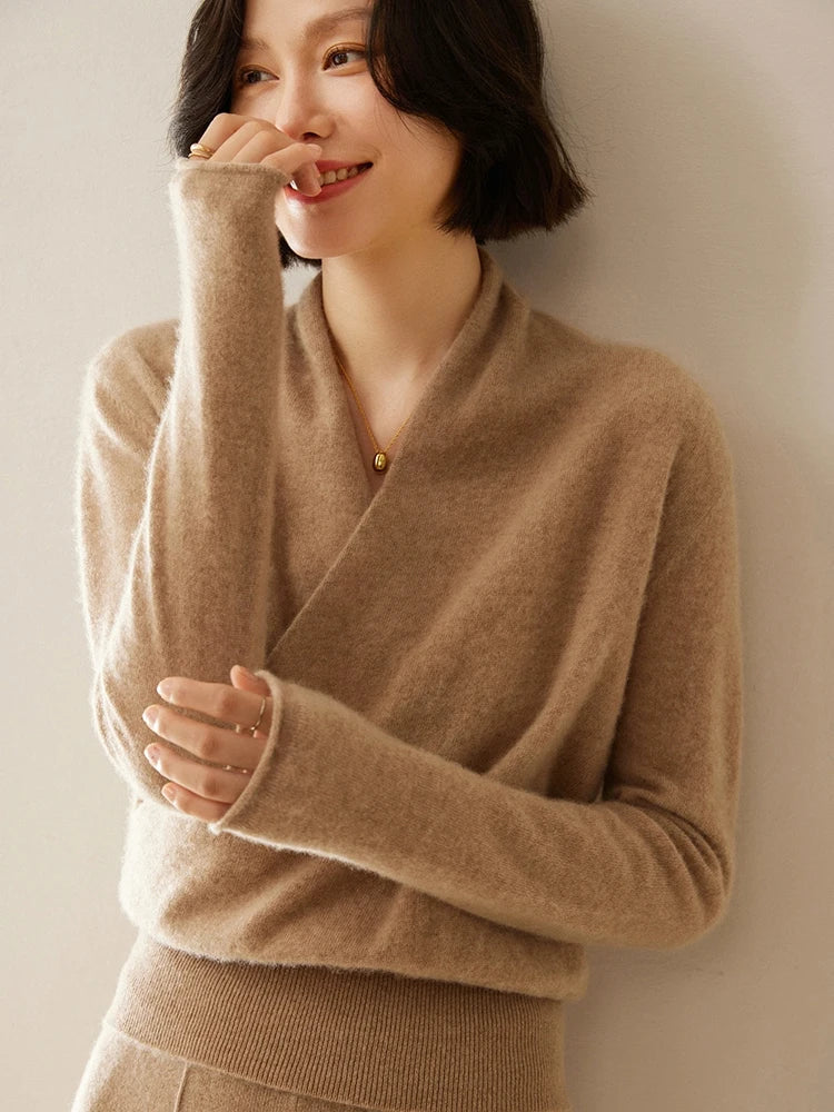 Women's classic black crossover wrap sweater with a relaxed fit, for all-day comfort.