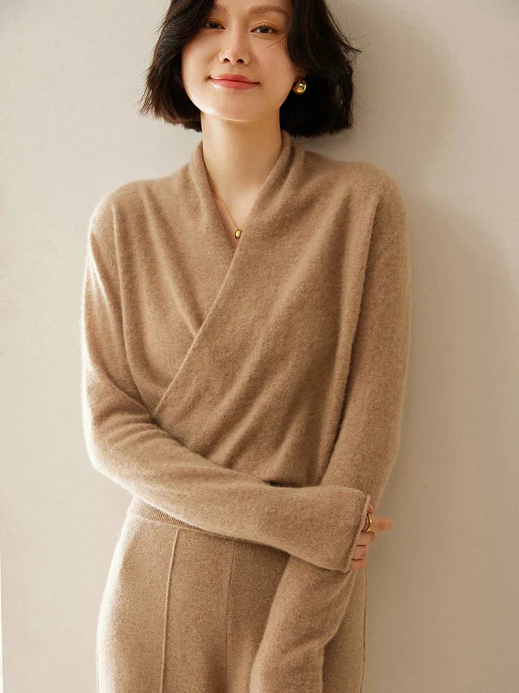 Women's soft knit long sleeve wrap sweater in a warm mustard yellow, autumnal style.