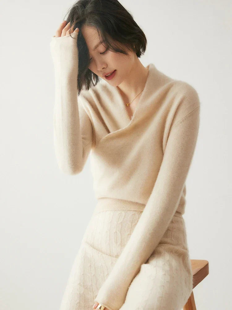 Close-up of the delicate knit pattern on a women's elegant crossover wrap sweater.