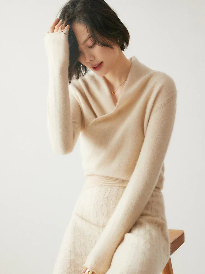 Close-up of the delicate knit pattern on a women's elegant crossover wrap sweater.