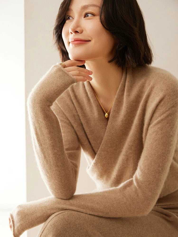 Women's versatile grey long sleeve wrap sweater, easily dressed up or down.