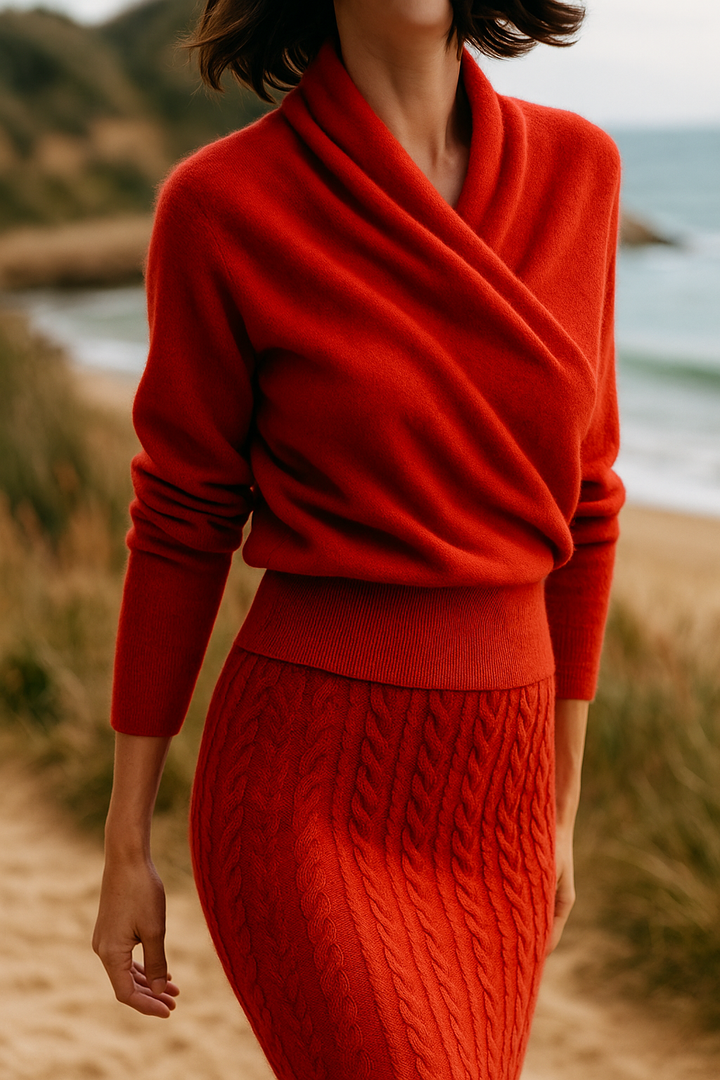 Candid shot of a woman enjoying coffee while wearing a cozy women's wrap sweater.