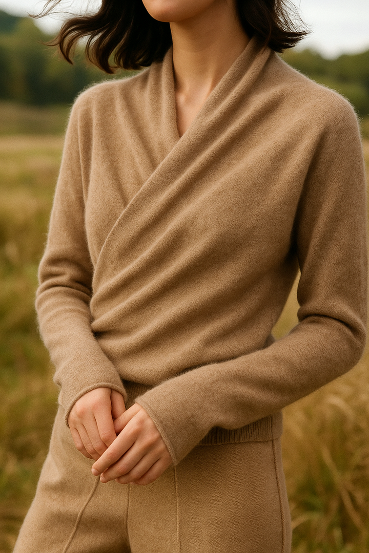 Women's stylish blue crossover wrap sweater, combining comfort with modern aesthetics.