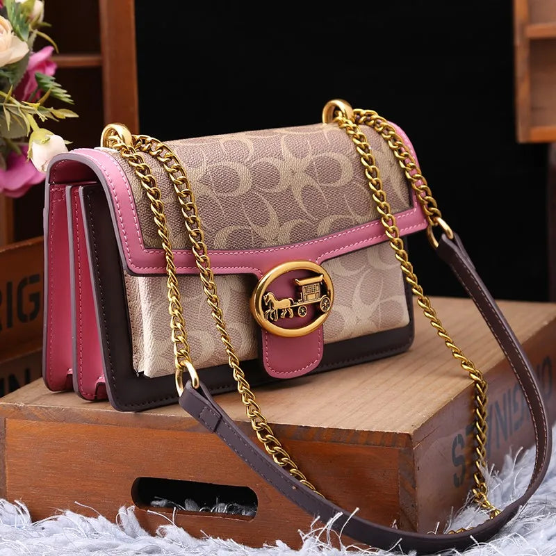 Elegant women's designer crossbody bag with a chic colorblock strap, perfect for fashion-forward daily wear.