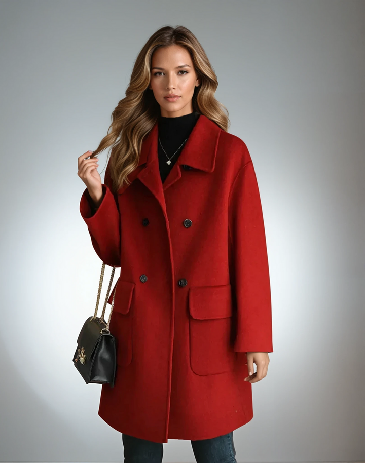 Front view of a minimalist women's double-breasted coat, ideal for elegant winter outerwear.
