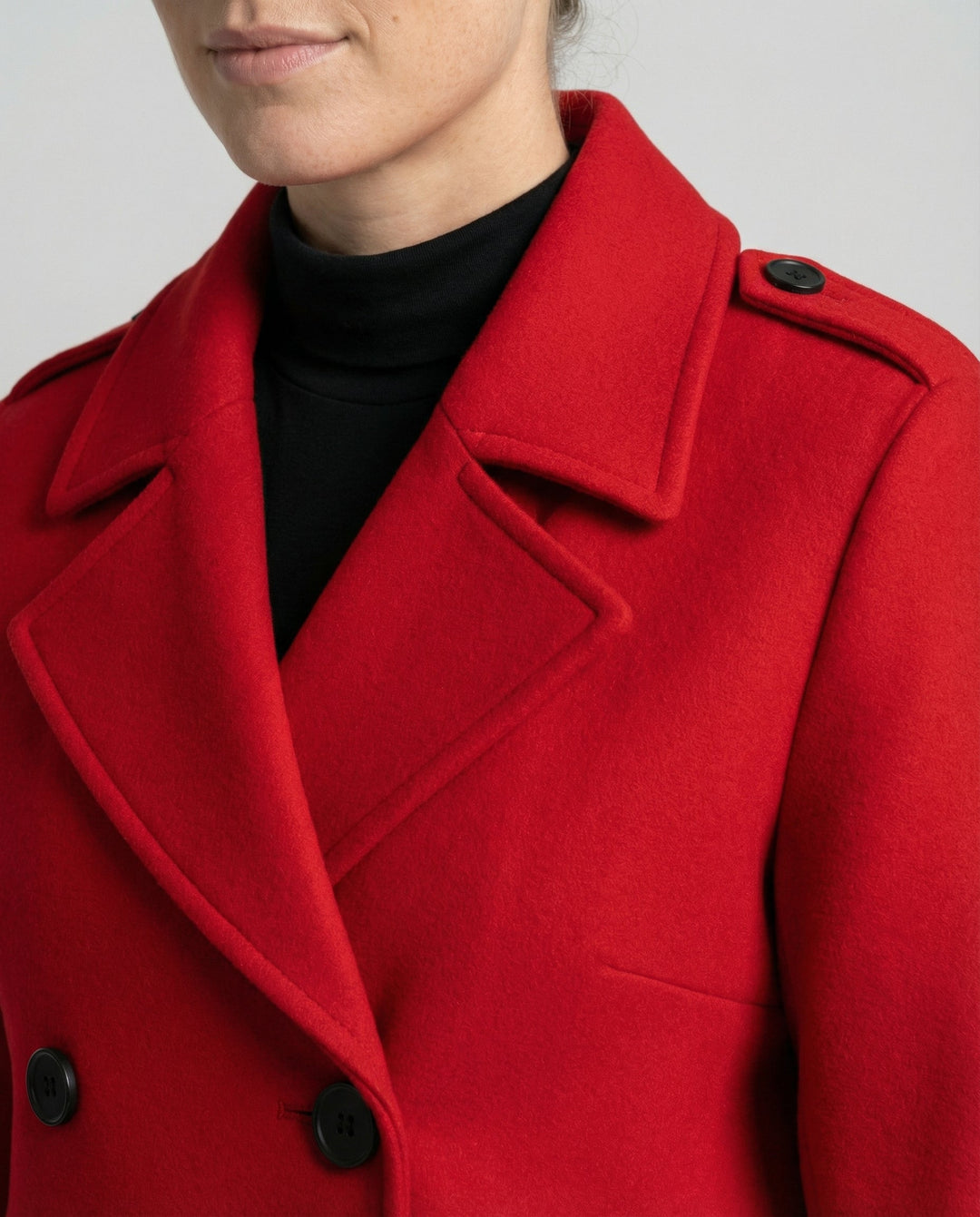 Women's tailored double-breasted full-length coat, a chic outerwear piece for fall and winter elegance.