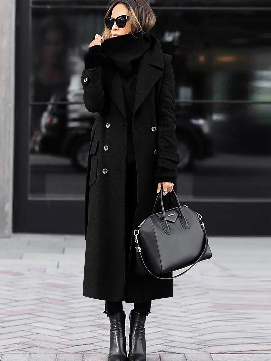 Modern women's tailored double-breasted full-length coat, perfect for formal fall and winter fashion.