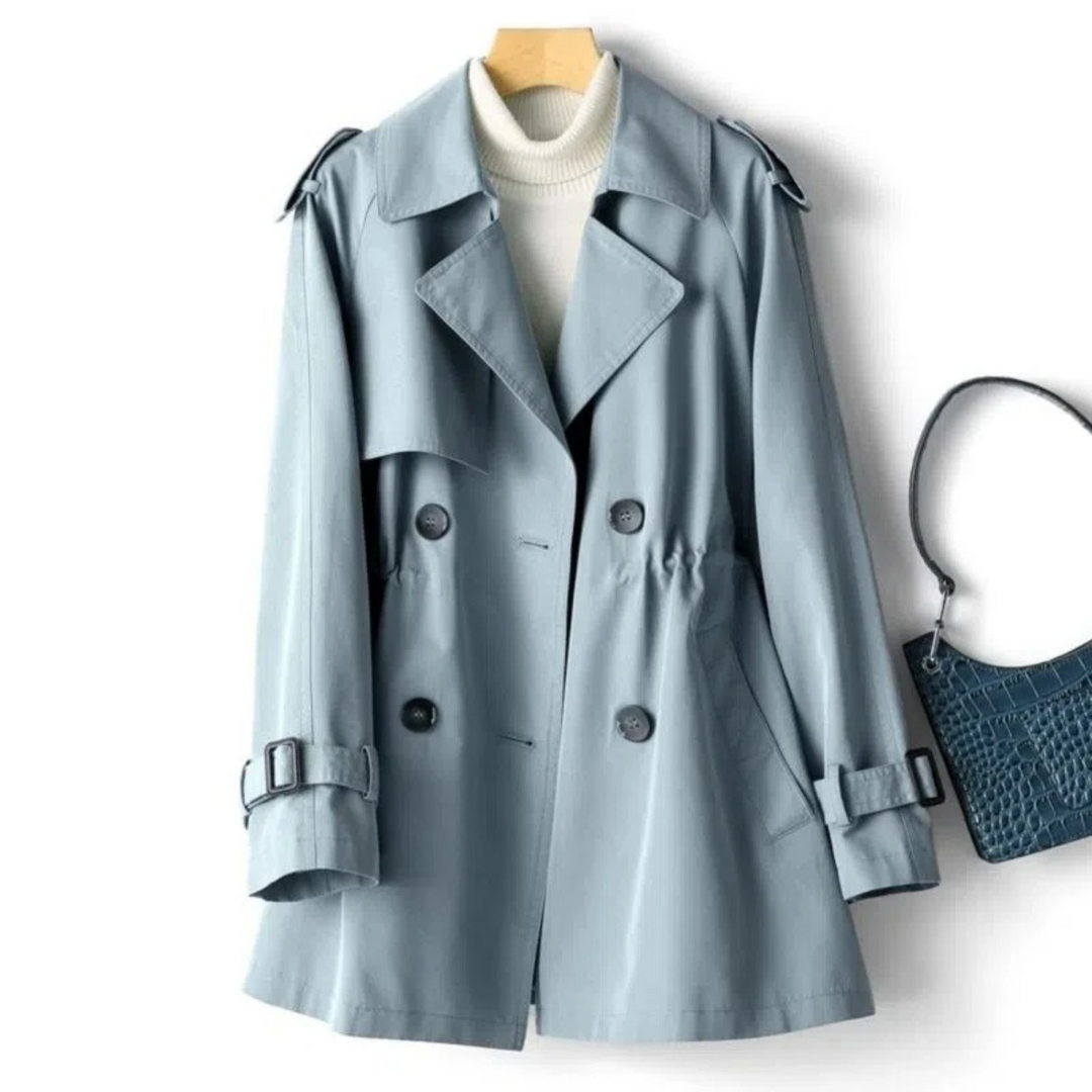 Fashionable long trench coat for women, featuring a double-breasted design and suitable as a winter coat