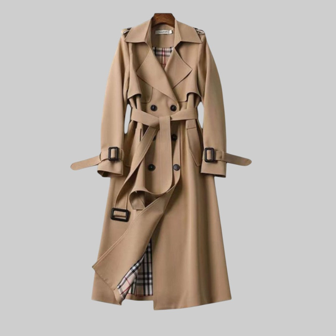 Elegant women's double-breasted long trench coat with belt, perfect for fall and winter outerwear.