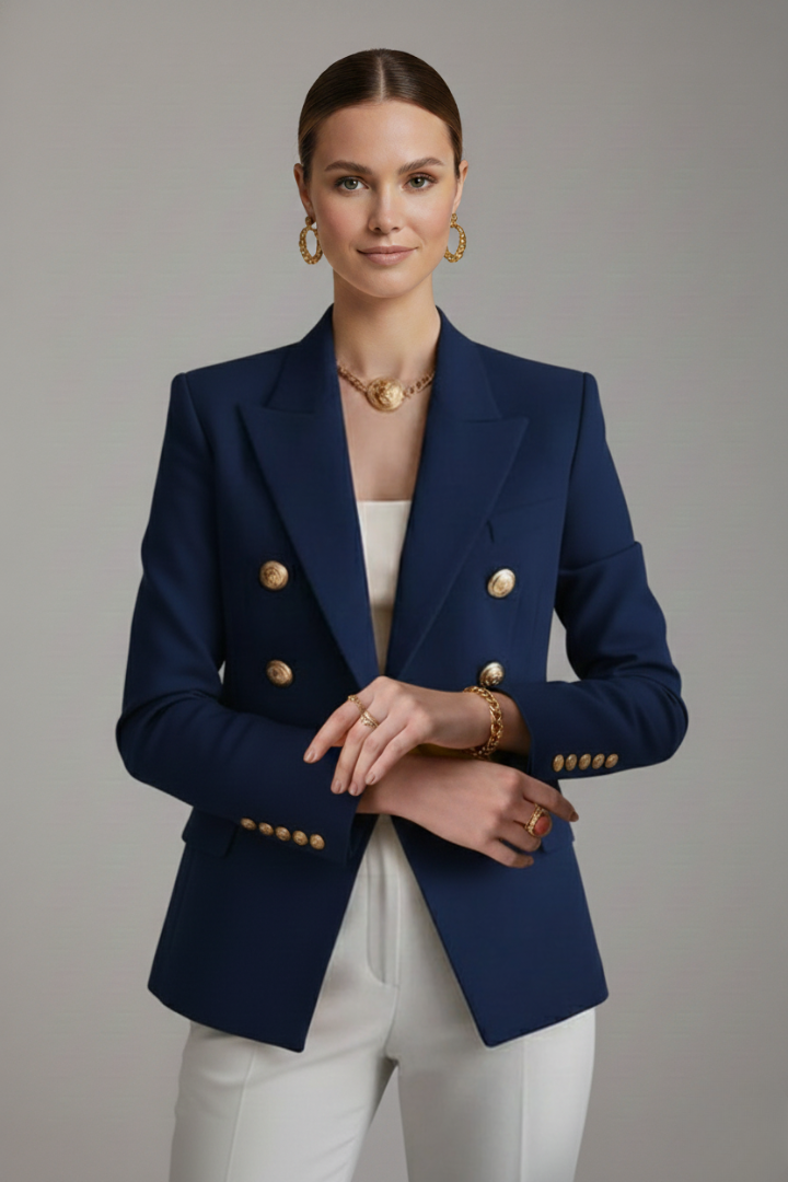 Back view of a women's double-breasted blazer showing tailored cut and hint of gold buttons