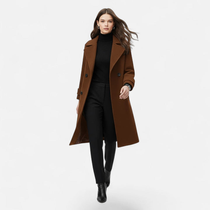 Sophisticated women's slim fit overcoat. Double-breasted long jacket, elegant winter outerwear for classic style.
