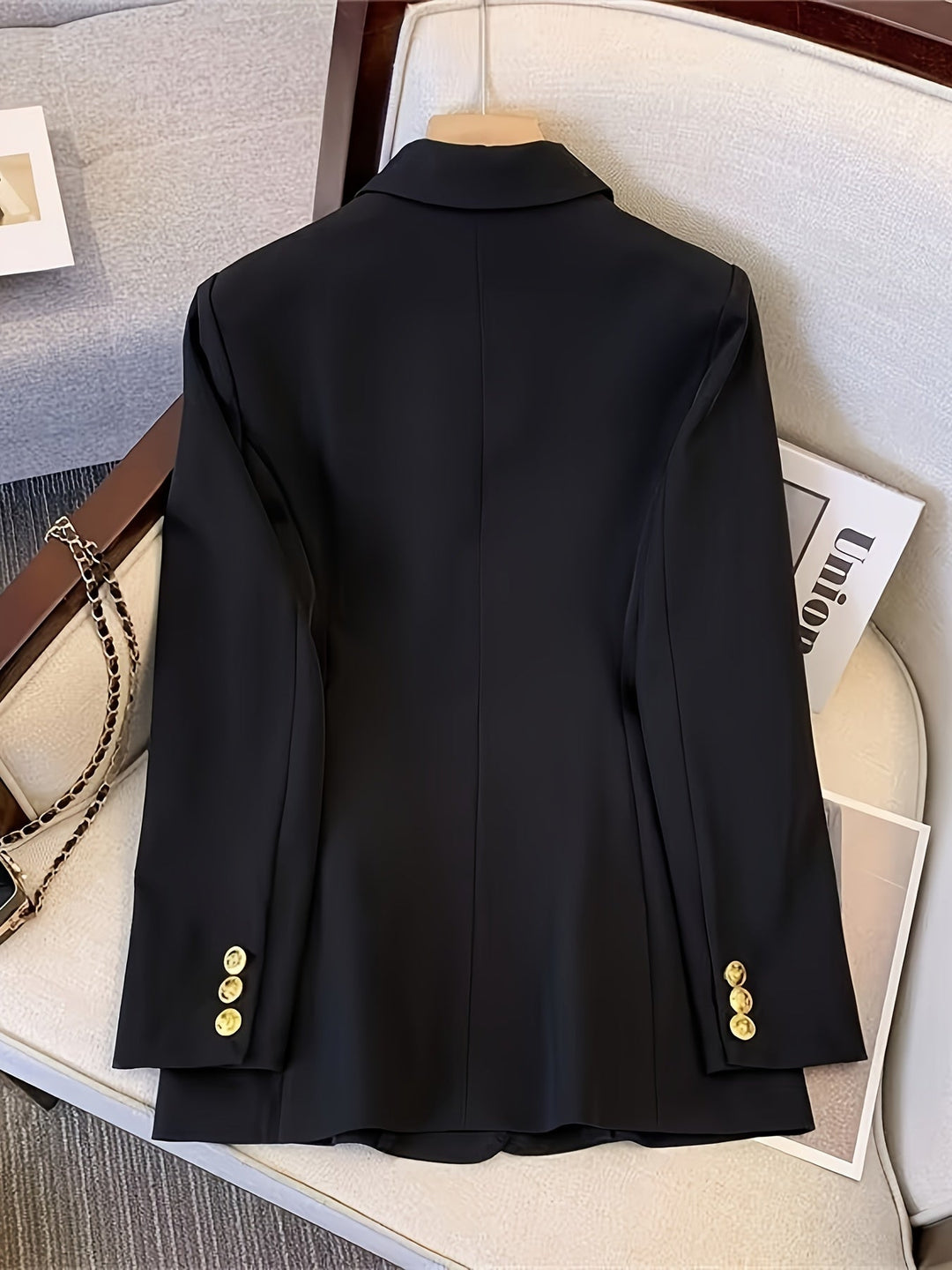 Classic women's double-breasted tailored blazer, a versatile piece for formal events and business casual outfits