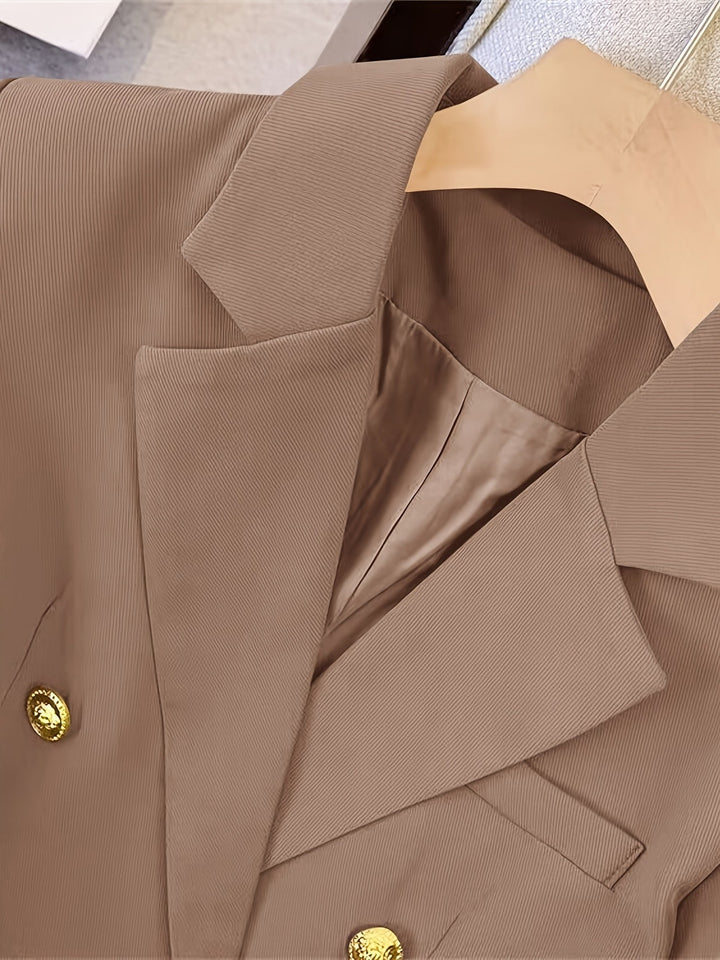Women's double-breasted tailored blazer, an essential long sleeve outerwear piece for a polished winter look