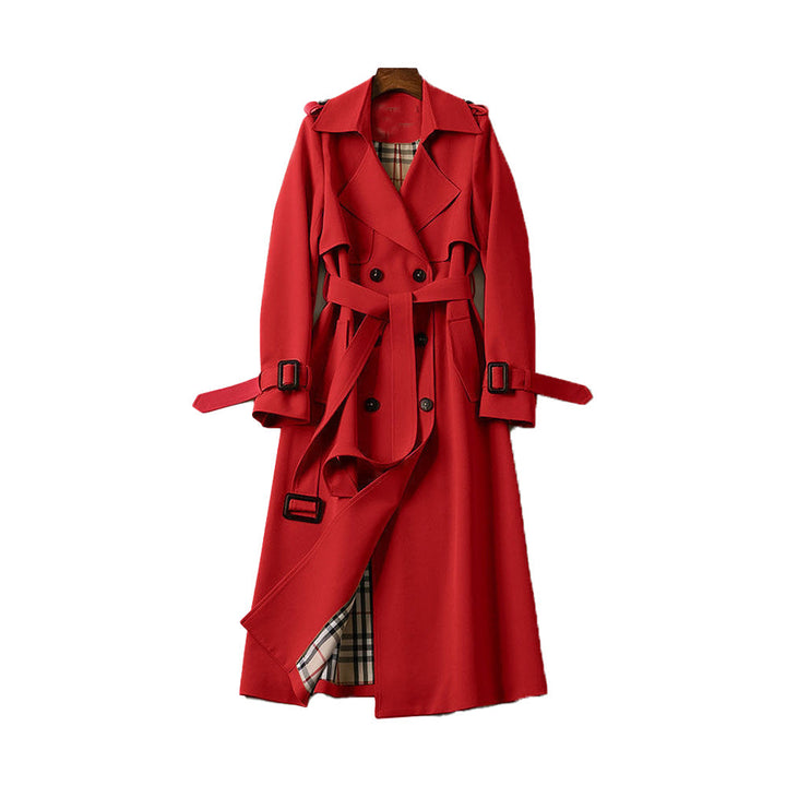 Classic women's fall fashion: a double-breasted, belted trench coat for elegant outerwear