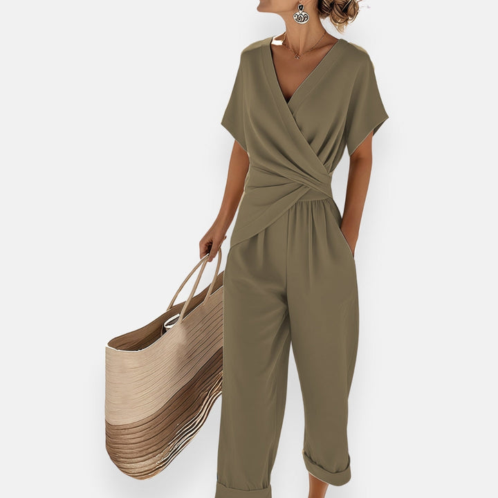 Stylish wide leg women's jumpsuit with a delicate bow detail, perfect for travel wear