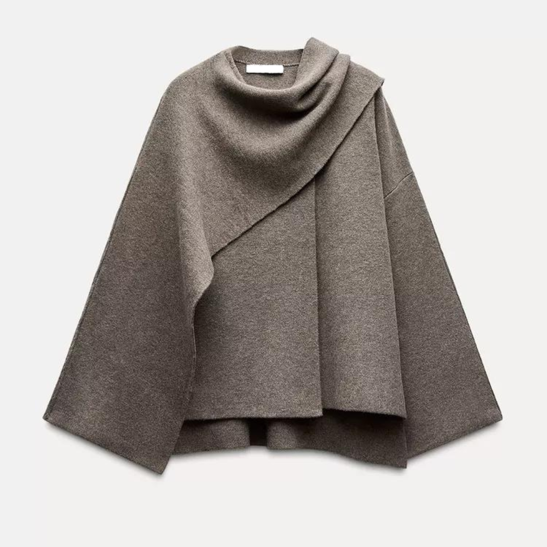 Chic women's draped cape coat, showcasing its elegant design and soft fabric, ideal for outerwear.