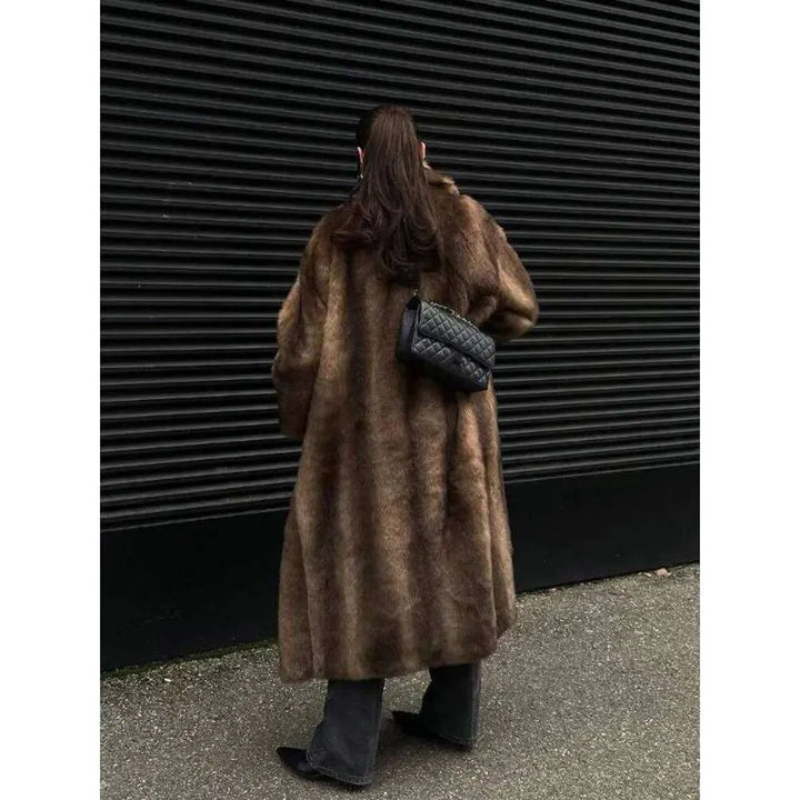 Stylish women's elegant faux fur coat, a plush and warm luxury jacket for sophisticated winter fashion.