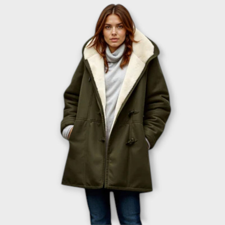 Warm women's thick winter coat featuring luxurious faux fur lining and stylish outerwear design.