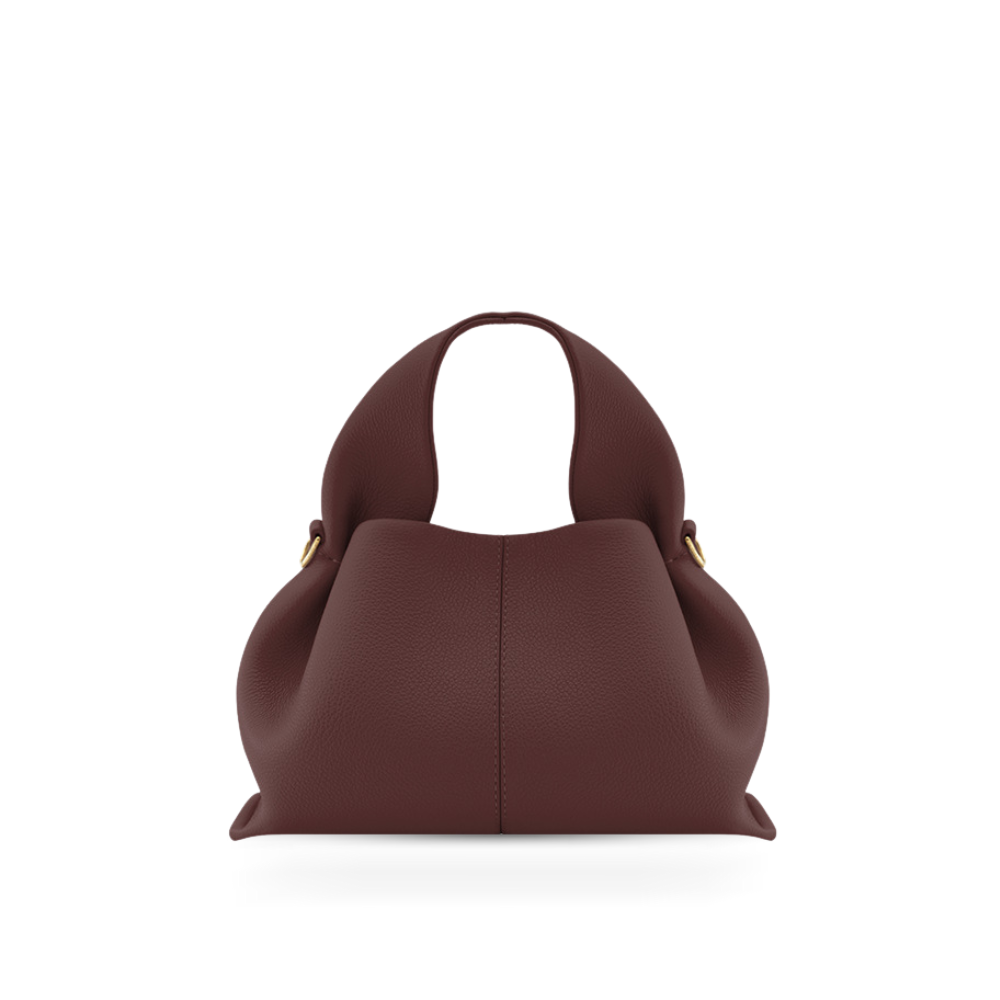 Chic women's handbag, versatile faux leather design, secure magnetic closure, stylish accessory.