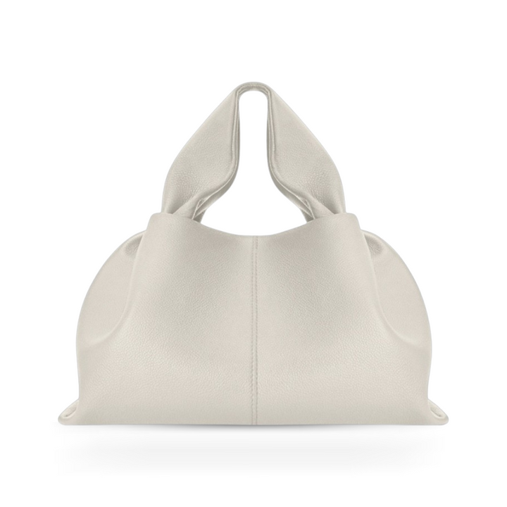 Modern women's shoulder bag with magnetic closure, elegant faux leather, convenient and stylish.