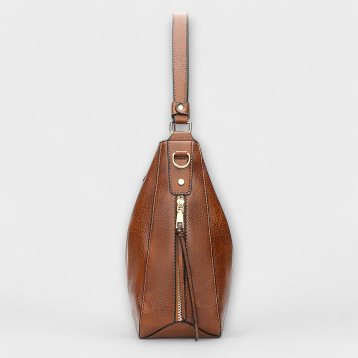 Close-up of elegant faux leather handbag, a versatile fashion accessory for women
