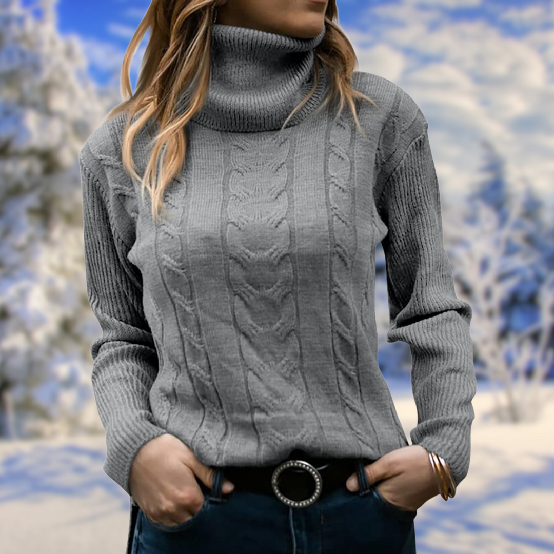 Soft women's fitted turtleneck sweater, highlighting the elegant knit, warm fabric, and long sleeves.