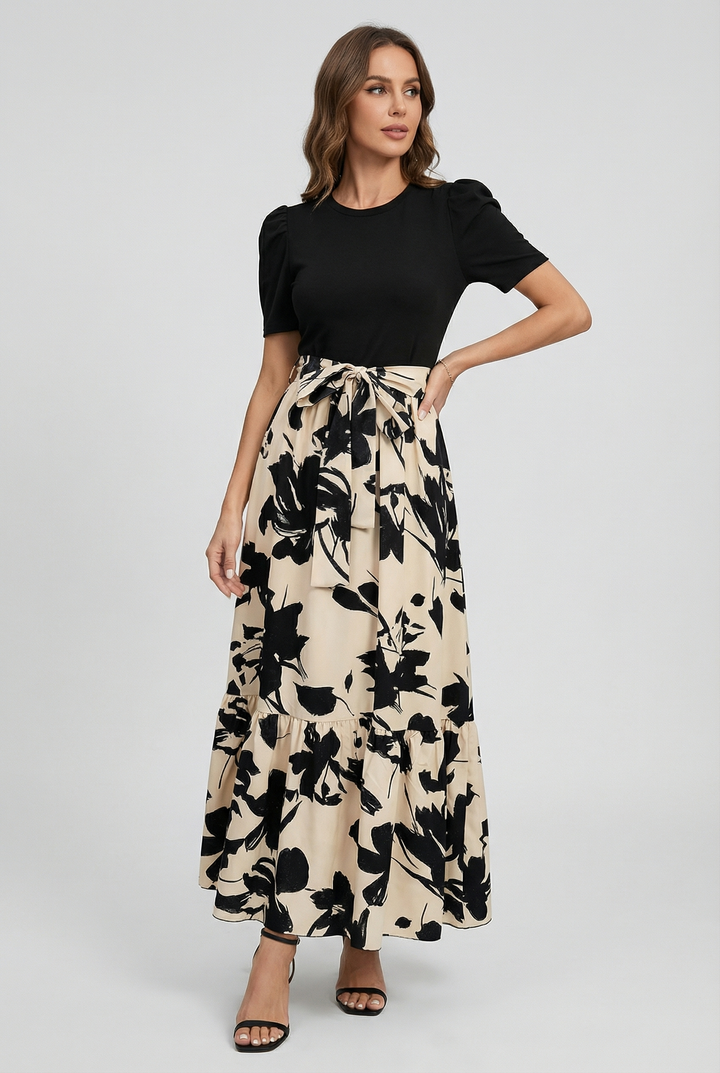 Elegant women's floral A-line maxi dress, perfect for summer occasions. Breezy, stylish day wear.