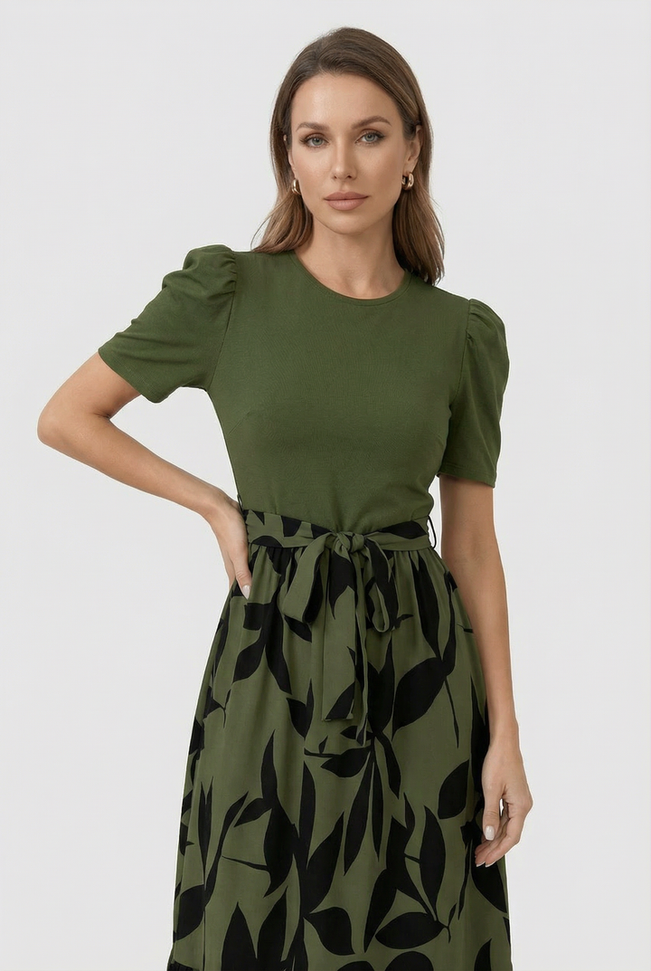 Stylish women's floral A-line maxi dress, suitable for summer events & elegant day wear. Short sleeve, round neck.