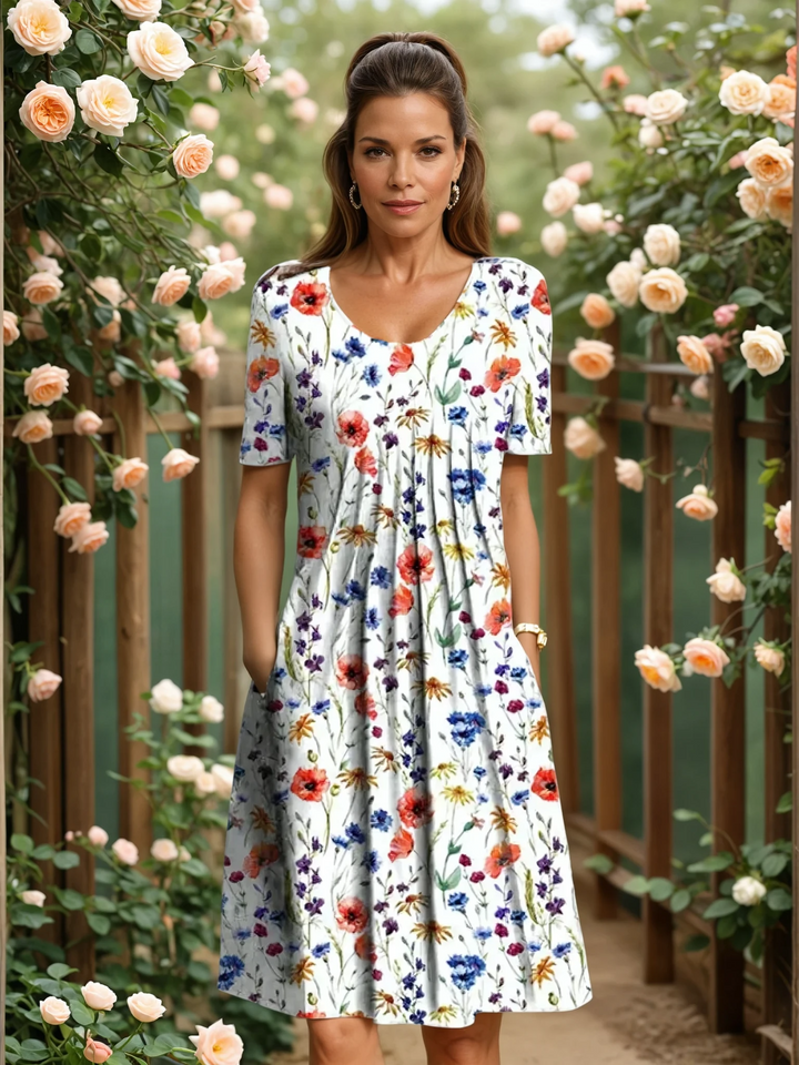 Elegant women's floral A-line midi dress. Features tummy coverage, sleeveless design, perfect for summer parties & brunch.