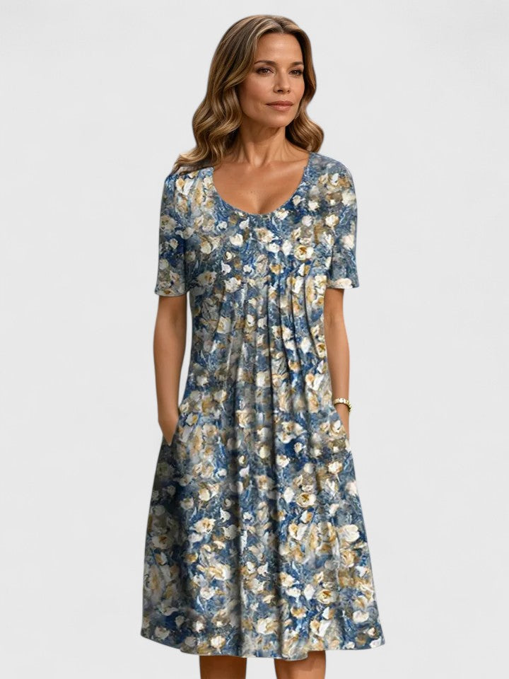 Stylish women's floral A-line dress with pockets, ideal for versatile summer fashion & casual chic occasions.