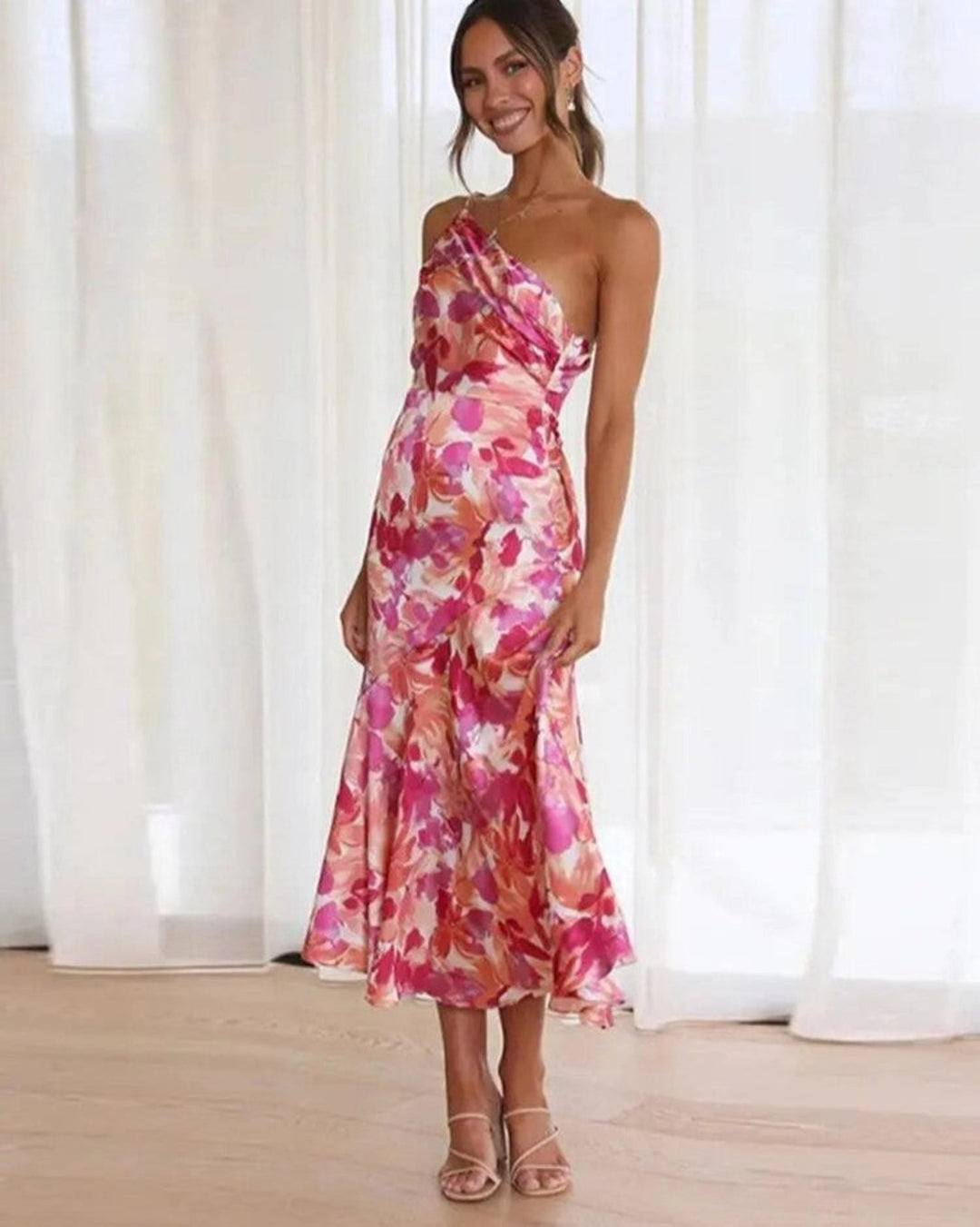 Elegant women's floral asymmetrical maxi dress, perfect for summer parties, sleeveless design.