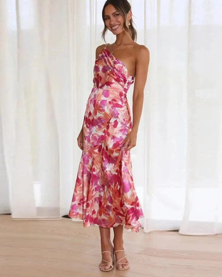 Elegant women's floral asymmetrical maxi dress, perfect for summer parties, sleeveless design.