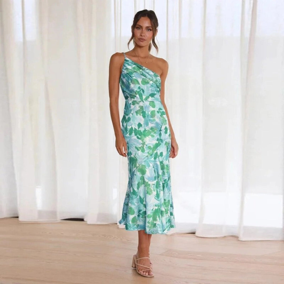 Sleeveless floral asymmetrical maxi dress, a must-have women's summer fashion piece, very elegant.