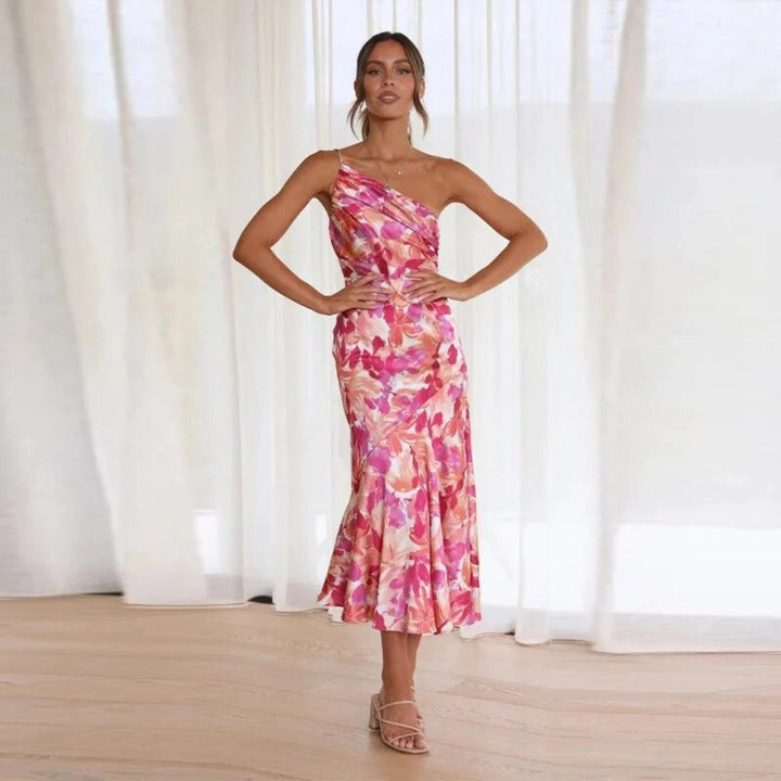 Women's asymmetrical floral print maxi dress, a versatile summer dress for both casual and party wear.