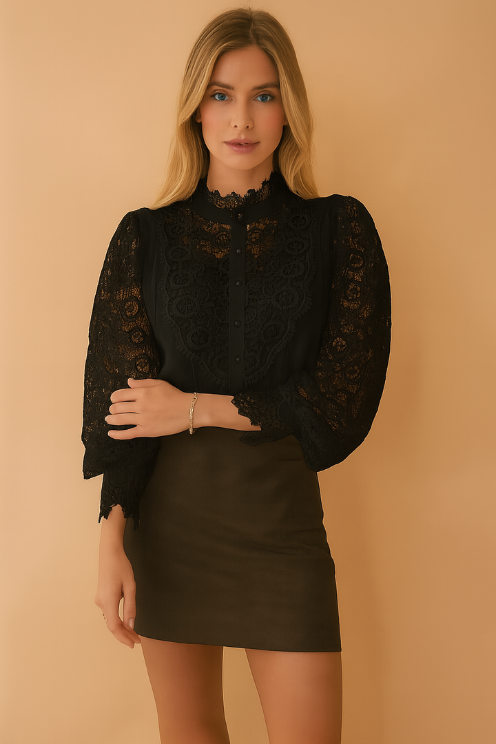 Stylish women's black floral puff sleeve blouse. A versatile and elegant top with a romantic design.