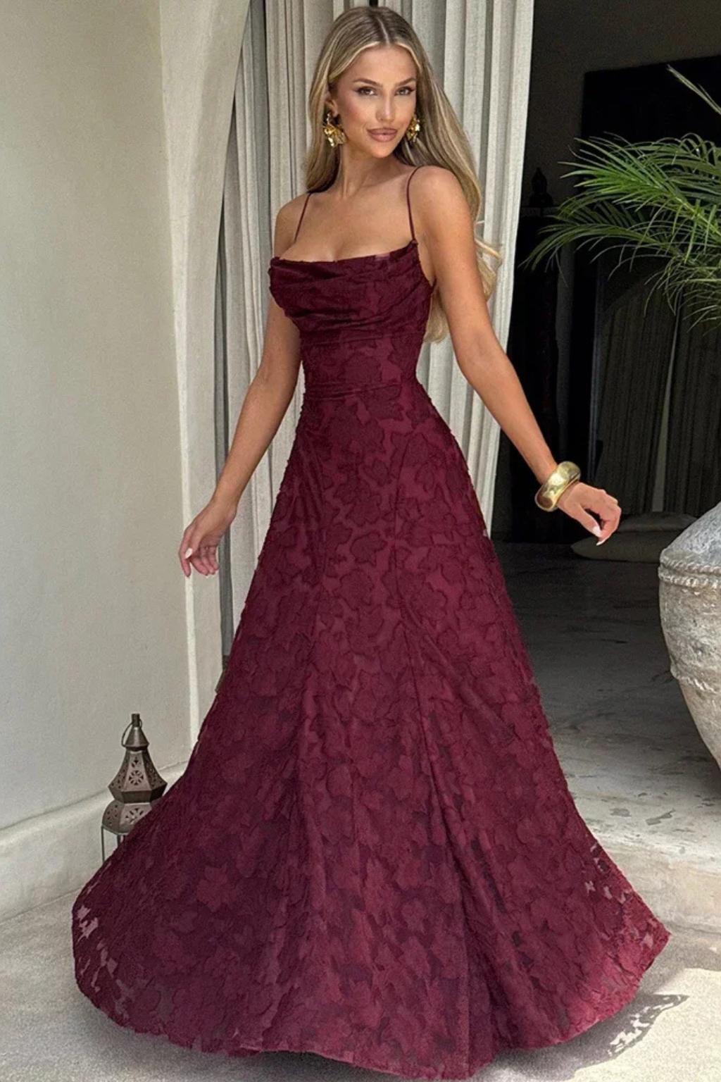 Sleeveless floral jacquard maxi dress with elegant backless lace-up design, perfect for evening wear.