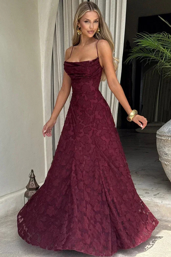 Sleeveless floral jacquard maxi dress with elegant backless lace-up design, perfect for evening wear.