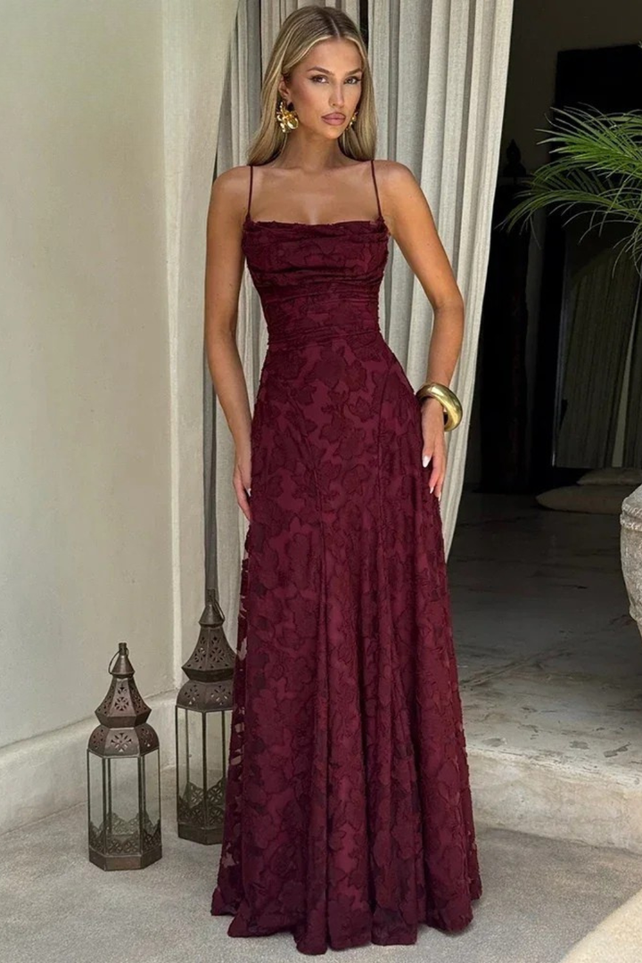 Women's elegant long formal evening gown, floral jacquard pattern, backless design, ideal for wedding guests.